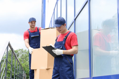 Professional house removals in Stanmore with packed boxes and moving van