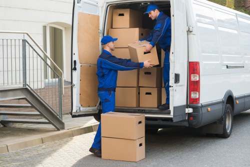 Office equipment being transported during a small removal job