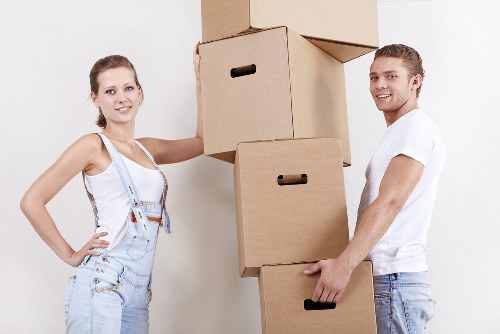 Professional movers handling household items in Stanmore