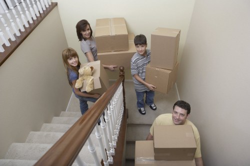 Local Stanmore removal team packing household items for safe transport